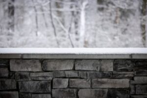 winter retaining wall visionary landscaping michigan